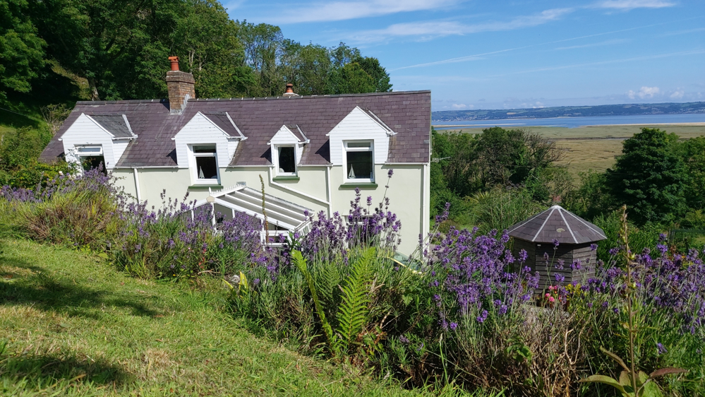 Weatherproof masonry paint applied a coastal house